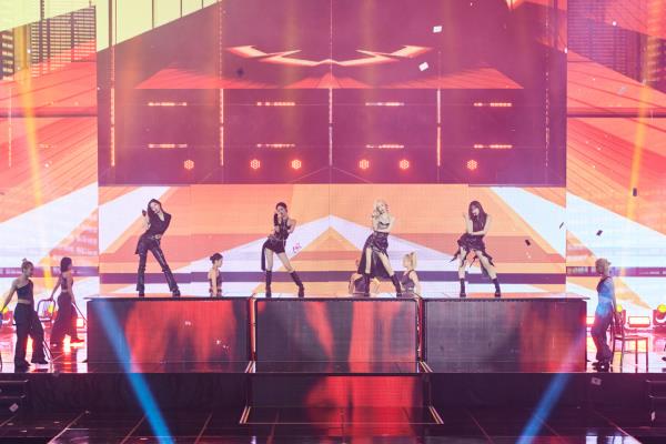 From left: aespa members Karina, Ningning, Winter, and Giselle perform at Jamsil Indoor Stadium in Seoul on Sunday. (SM Entertainment)