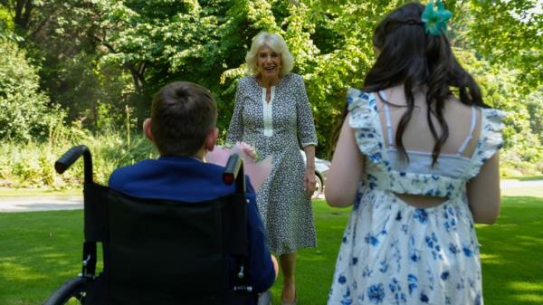 Pic: Buckingham Palace/PA Wire 
Handout photo issued by Buckingham Palace of Queen Camilla with Tony Hudgell, from West Malling in Kent, and Lyla O'Do<em></em>novan from Catterick, during a private tea party in the gardens Summer House at Buckingham Palace, London, on Wednesday June 26, hosted by the queen. Issue date: Mo<em></em>nday July 1, 2024. PA Photo. Photo credit should read: Buckingham Palace/PA Wire 