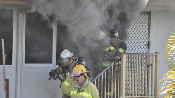 House fire at 49 Anne Street Charters Towers. The family of twelve flee after the fire destroys home after a fan heater sparked the fire and o<em></em>nly a skeleton of the house remaining.